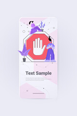 businesspeople working near big red forbidding sign with human hand stop gesture do not enter dangerous concept