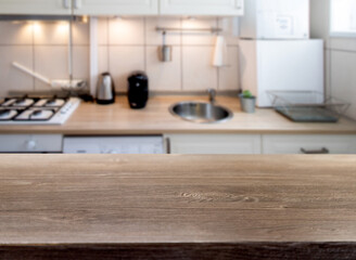 Obraz na płótnie Canvas blurred kitchen interior and desk space