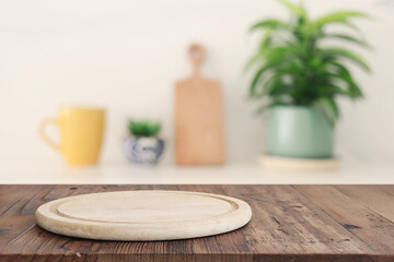 empty table board and defocused modern kitchen background. product display concept