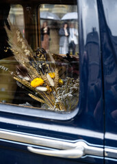 Wedding flowers in a wedding car