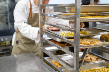 Elaboration of design dishes. Scenes of real teamwork by great Spanish professionals of gourmet haute cuisine for social events