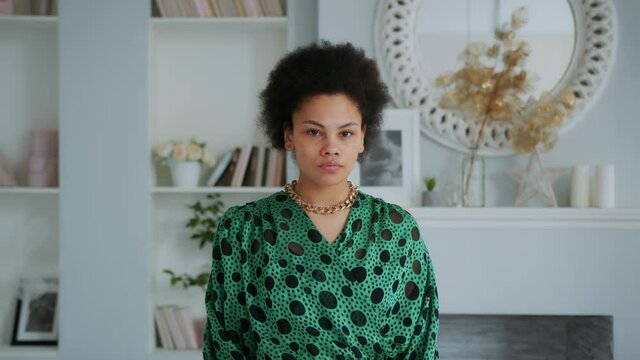 Young African American Teen Girl with Problem Skin Looks at the Camera Like in a Mirror. Acne treatment Time Lapse - 22th day of 28. Woman Skin Care Concept.