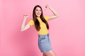 Profile photo of optimistic young lady point herself wear orange t-shirt skirt isolated on pastel pink color background