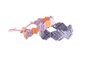 DIY woven tied friendship bracelets with unusual braiding. Summer accessory