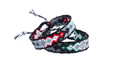 DIY woven tied friendship bracelets with unusual braiding. Summer accessory