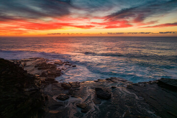 Aerial Sunrise Seascape at Rocky Inlet with colourful high cloud