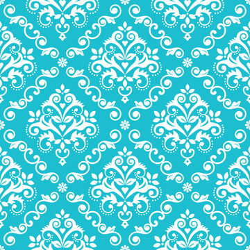 Classic Damask wallpaper or fabric print pattern, royal elegant textile vector seamless design with flowers, leaves and swirls in white on turquoise background
