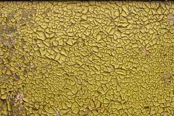 The old cracked paint on a wall surface