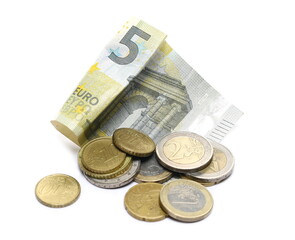 Five euro note with metal coins, cents, cash money isolated on white background