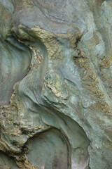 Fototapeta na wymiar バックグラウンド背景、自然石の彫像のような紋様が面白い