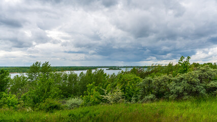 Fototapeta na wymiar Stormy clouds above the Markkleeberger Lake near Leipzig
