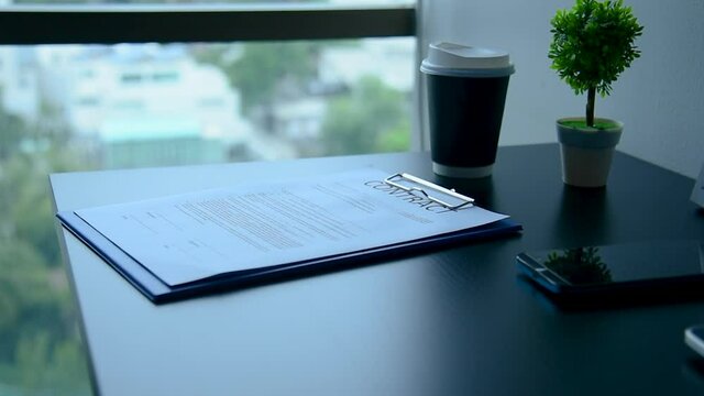 Meeting room Office laptop business financial document chart , graph on wooden table with coffee cup. Flat lay notebook computer laptop on office desk. No people business graph chart on meeting table