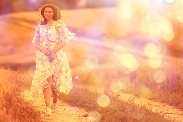 happy girl freedom in summer field, glare of the sun abstract background france provence autumn