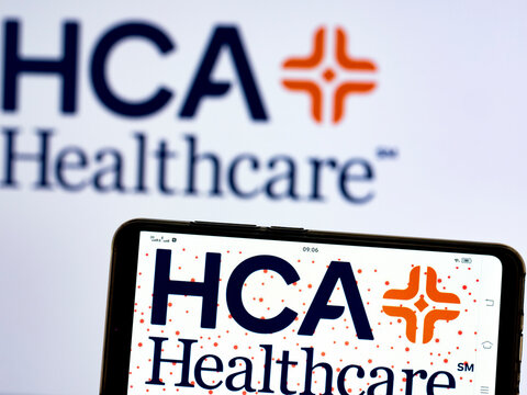 In this photo illustration Hospital Corporation of America (HCA Holdings, Inc.) logo seen displayed on a smartphone