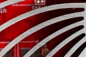 A fragment of a copper massive radiator for cooling a modern silent video card. No cooler. Macro