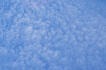 Fluffy clouds. Blue sky background