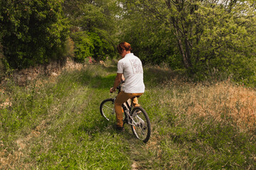 Fototapeta na wymiar man riding a bicycle