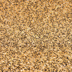Yellow wall or floor made of clastic stones. The one of decorative designs for using as background and texture.