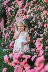 little girl in the flower garden