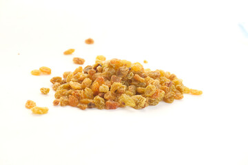  dried raisin on white background with copy space 