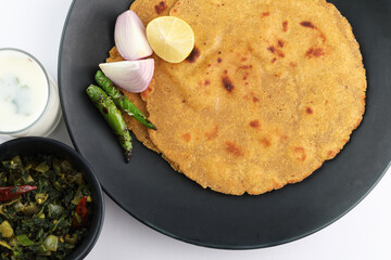 Sarson ka saag and Makki ki roti /Indian Punjabi corn bread with mustard leaves curry