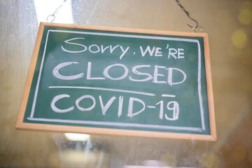 Temporarily closed sign for Covid-19 in small business activity