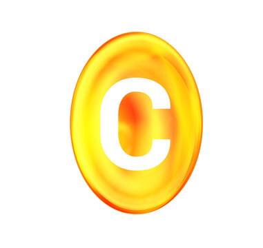 Golden capsule with vitamin C on white background.