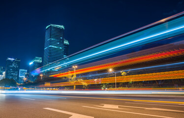 Fototapeta na wymiar modern buildings in modern city from elevated road at night