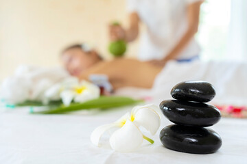 A pile of balancing smooth rocks, spa treatment concept.