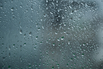 Rain drops on the glass of the windows.