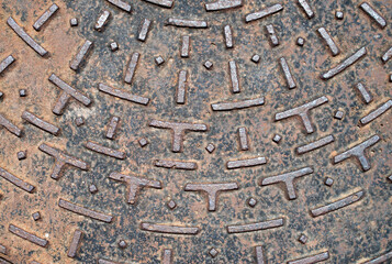 Cast iron surface with ornaments close