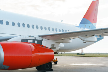 Close up of passenger airplane on the airport runway
