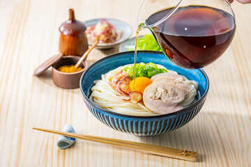 Kamatama-udon.Japanese udon noodle with raw egg.