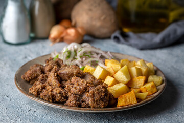Liver pan (Albanian liver) Turkish traditional food. Liver over rice. (Turkish name; arnavut ciger)