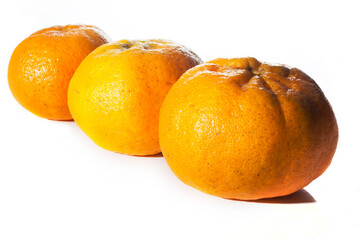 Mandarin, tangerine fruit and segments isolated on white background.
