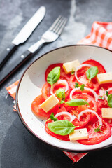 tomato salad veggie vegetable basil diet on the table summer healthy food diet meal snack copy space food background rustic. top view vegan or vegetarian food