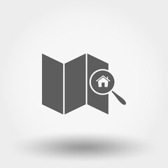 House on the map under a magnifying glass.