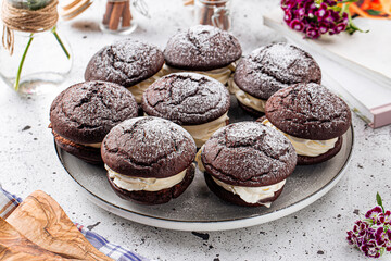 Fresh baked american chocolate whoopie pies with cream filling © Hihitetlin