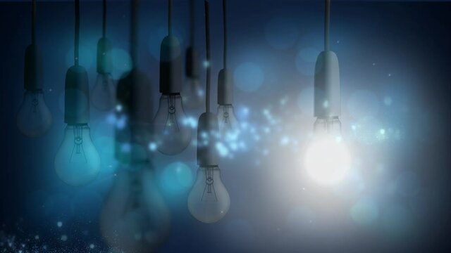 Animation of light bulbs with glowing flicekring spots and copy space