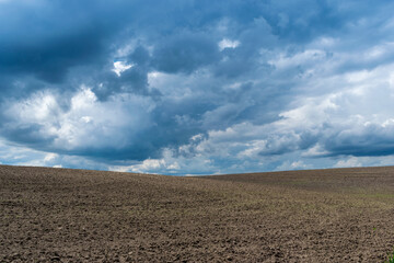 Stormy clouds over the field