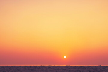 Tropical beach with smooth wave and sunset sky abstract background.
