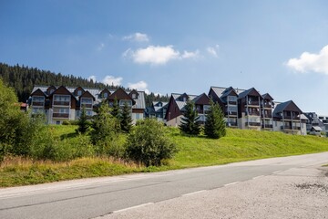 Fototapeta na wymiar The Giant Mountains (Krkonose) landscape with a houses for recreation