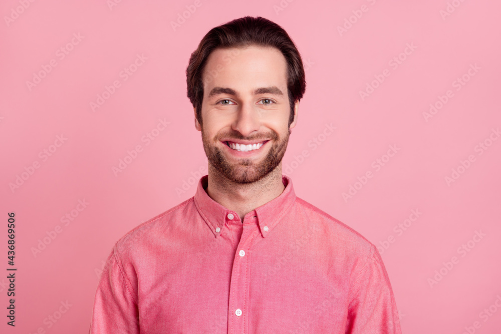 Sticker Photo of happy attractive charming young man smile good mood cheerful isolated on pastel pink color background