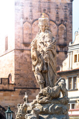 Fototapeta na wymiar Statue of St Vitus on Charles Bridge in Prague, Czech Republic