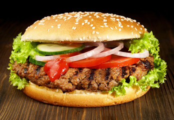 Big Size Hamburger - Fast Food on wooden Background