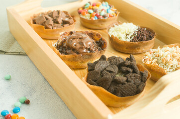 Martabak Manis is Indonesia dessert. Sweet Martabak with chocolate, cheese, peanut. this picture in white background and blurry, selective object.
