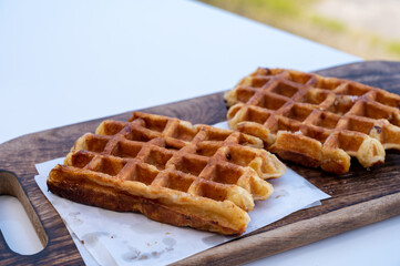 Belgian sugar waffles served on outdoor cafe terrace