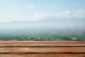 Wooden old background on natural background with mountain and sk