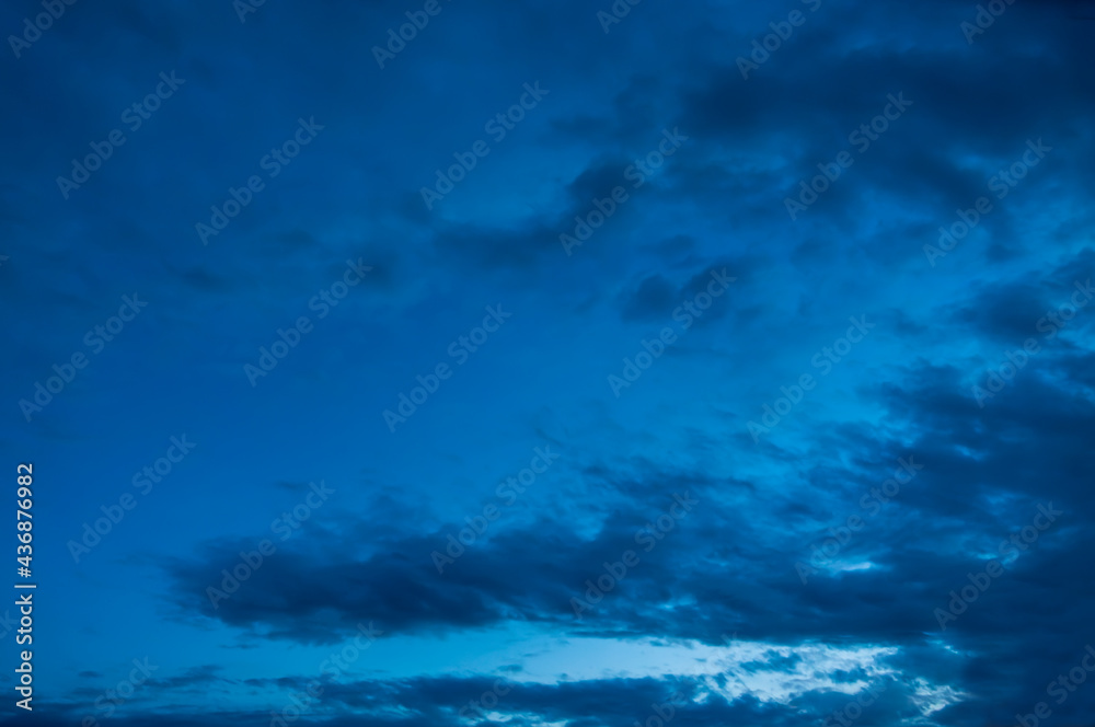 Wall mural beautiful sky with clouds at blue hour, sky remplacement, nature background