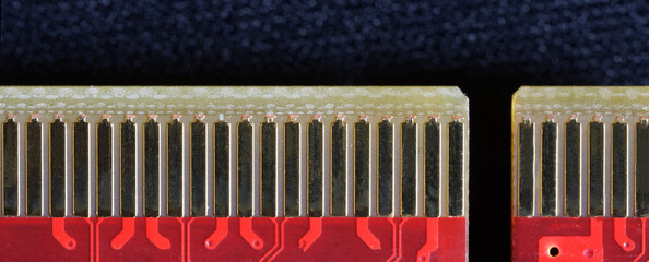 A fragment of a PCI-e express connector of a modern video card. Macro. Web banner
